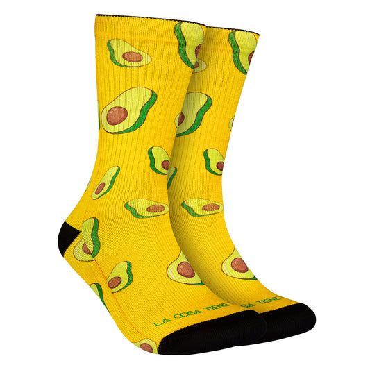 Calcetines amarillos con estampado de aguacates, aportando un toque vibrante y original a tu look.