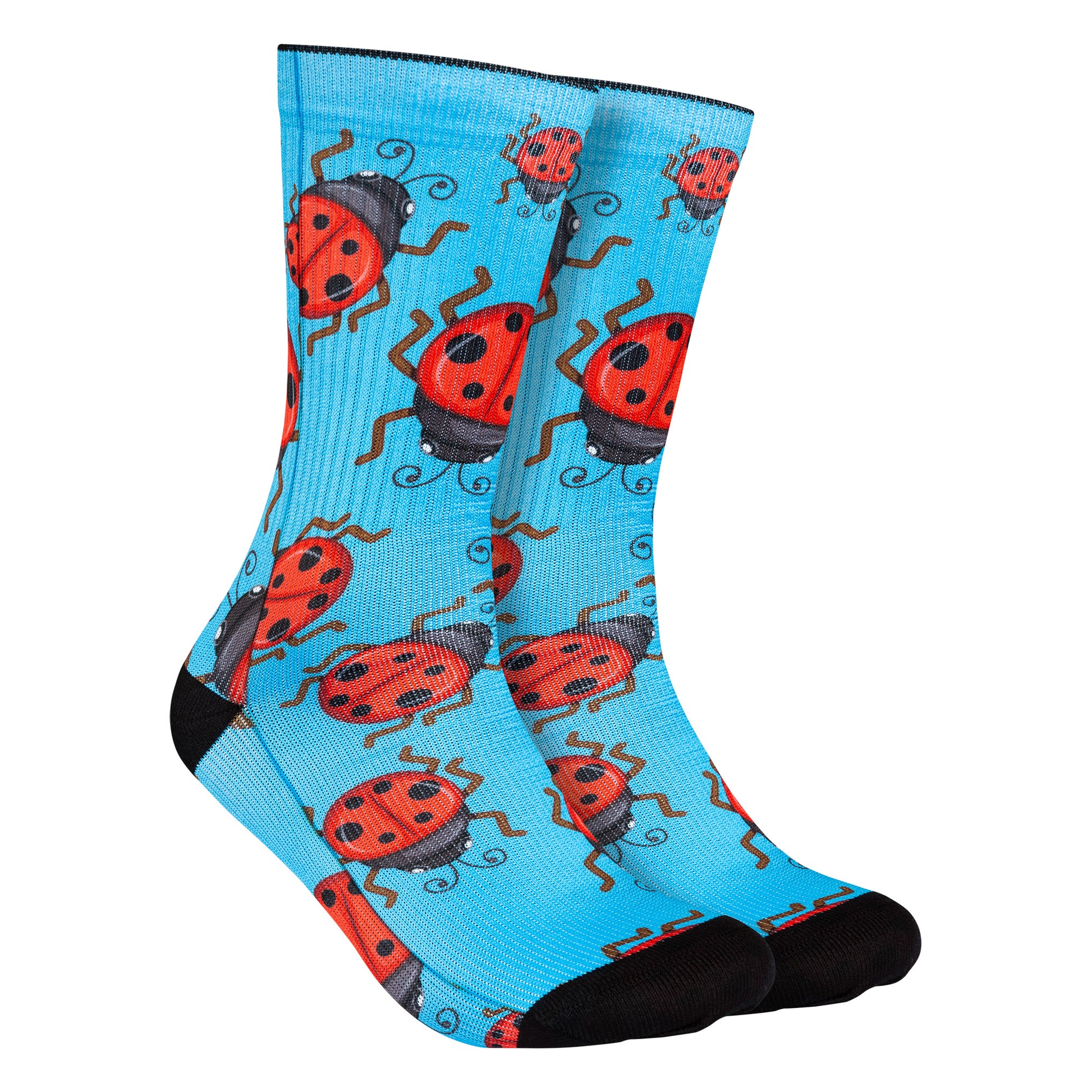 Calcetines azules con estampado de mariquitas rojas, ideales para añadir un toque natural y colorido a tu atuendo.
