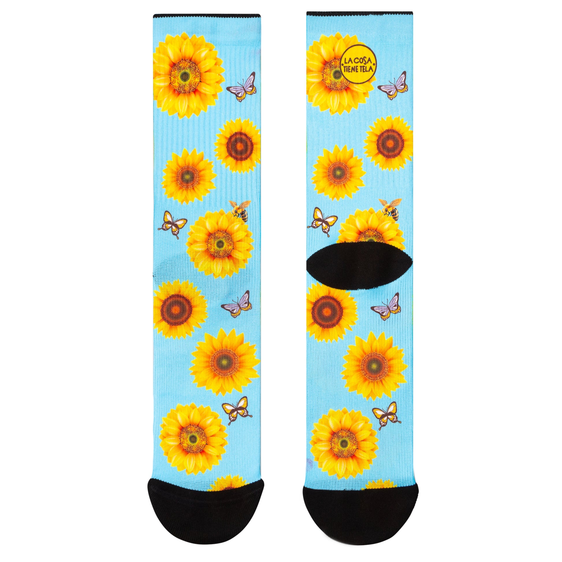 Parte delantera y trasera de los calcetines azules con estampado de girasoles amarillos, aportando un toque alegre y natural a tu estilo.