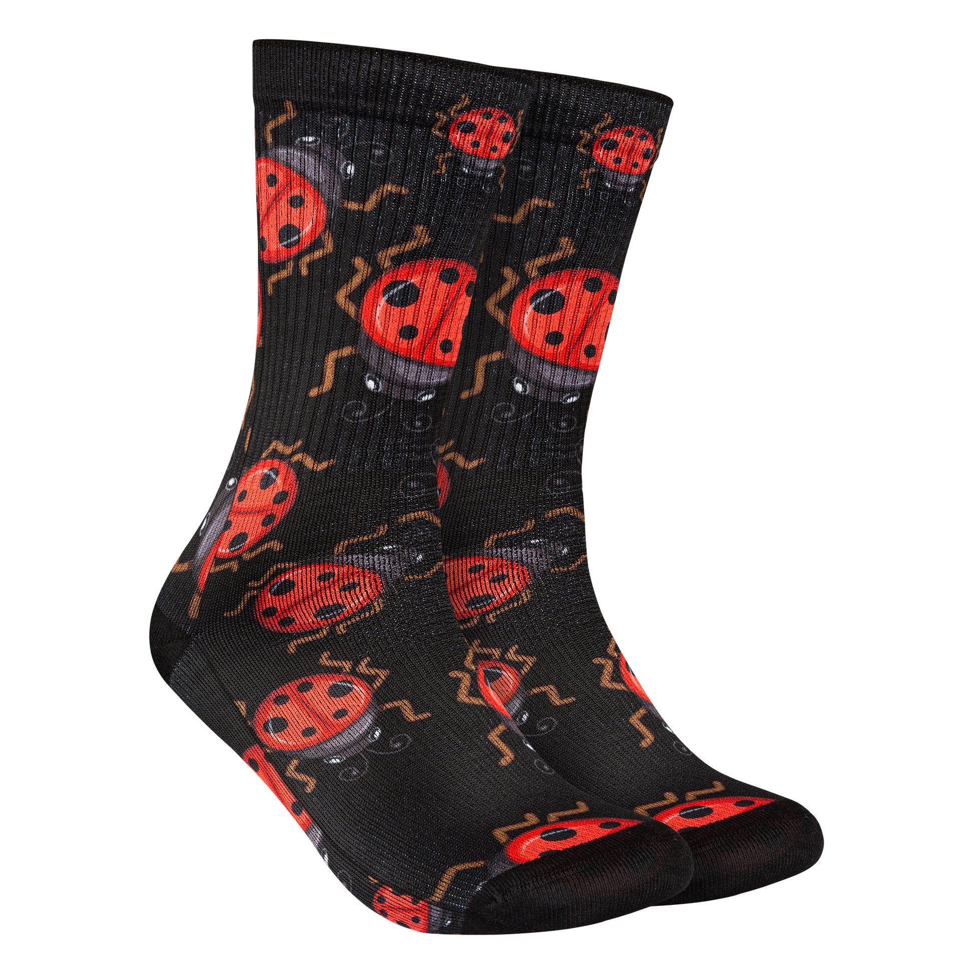 Calcetines negros con estampado de mariquitas rojas, aportando un toque delicado y natural a tu estilo.