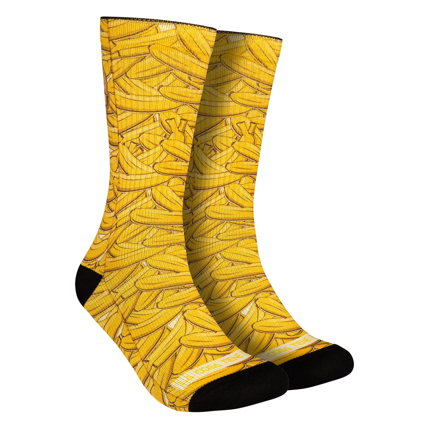 Calcetines con estampados de plátanos de Canarias (amarillos), aportando un toque tropical y divertido a tu estilo.