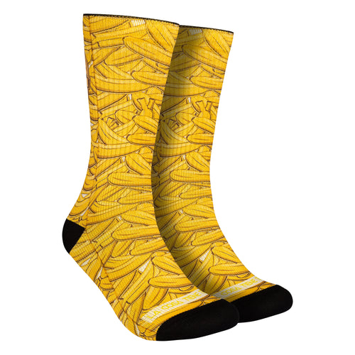 Calcetines con estampados de plátanos de Canarias (amarillos), aportando un toque tropical y divertido a tu estilo.